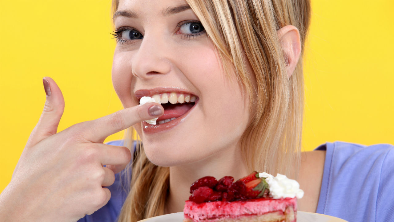 girl eating cake