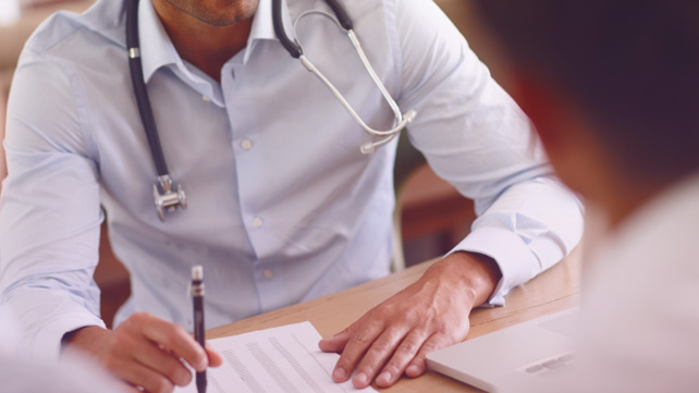 doctor explaining biologics to patient