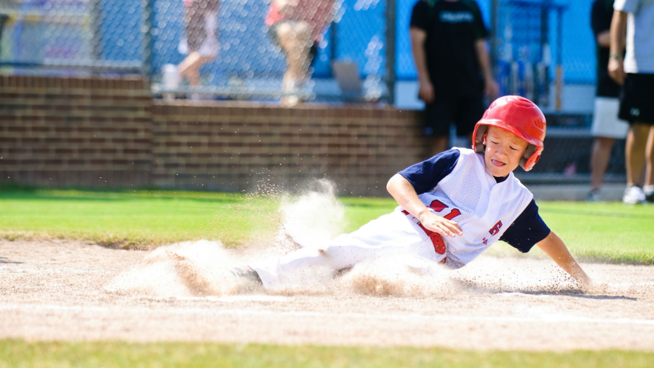 boy playing baseball