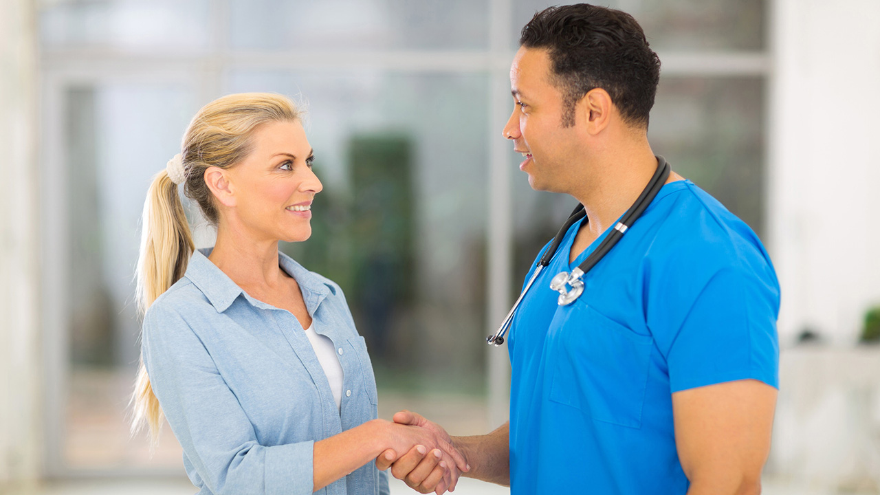 Woman meets with her doctor