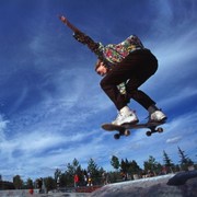 girl flying on skateboard