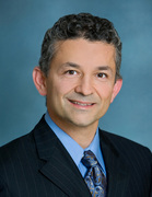 Dr. Kam Raiszadeh