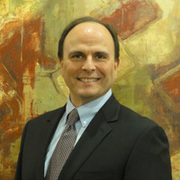 Dr. John Couvaras